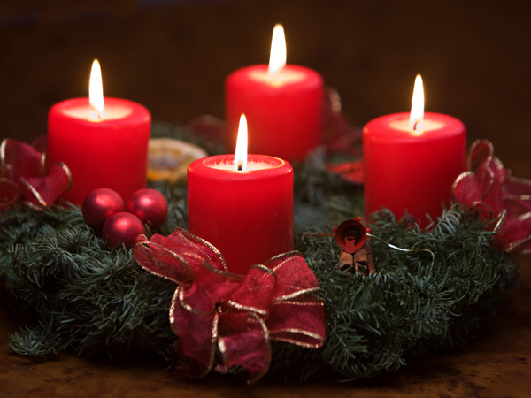 Four lighted candles on Advent